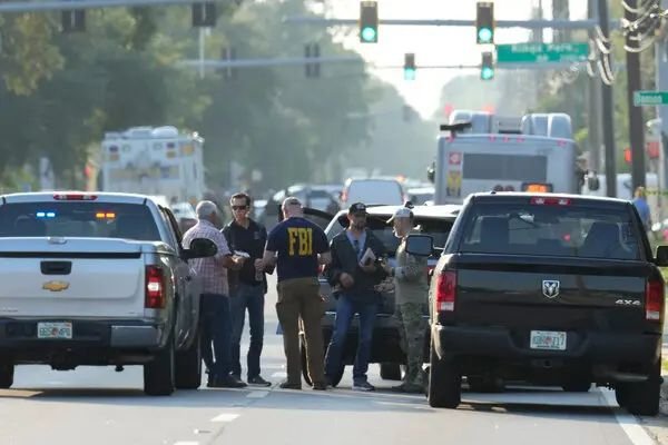 White man with swastika sign killed three black people in Florida